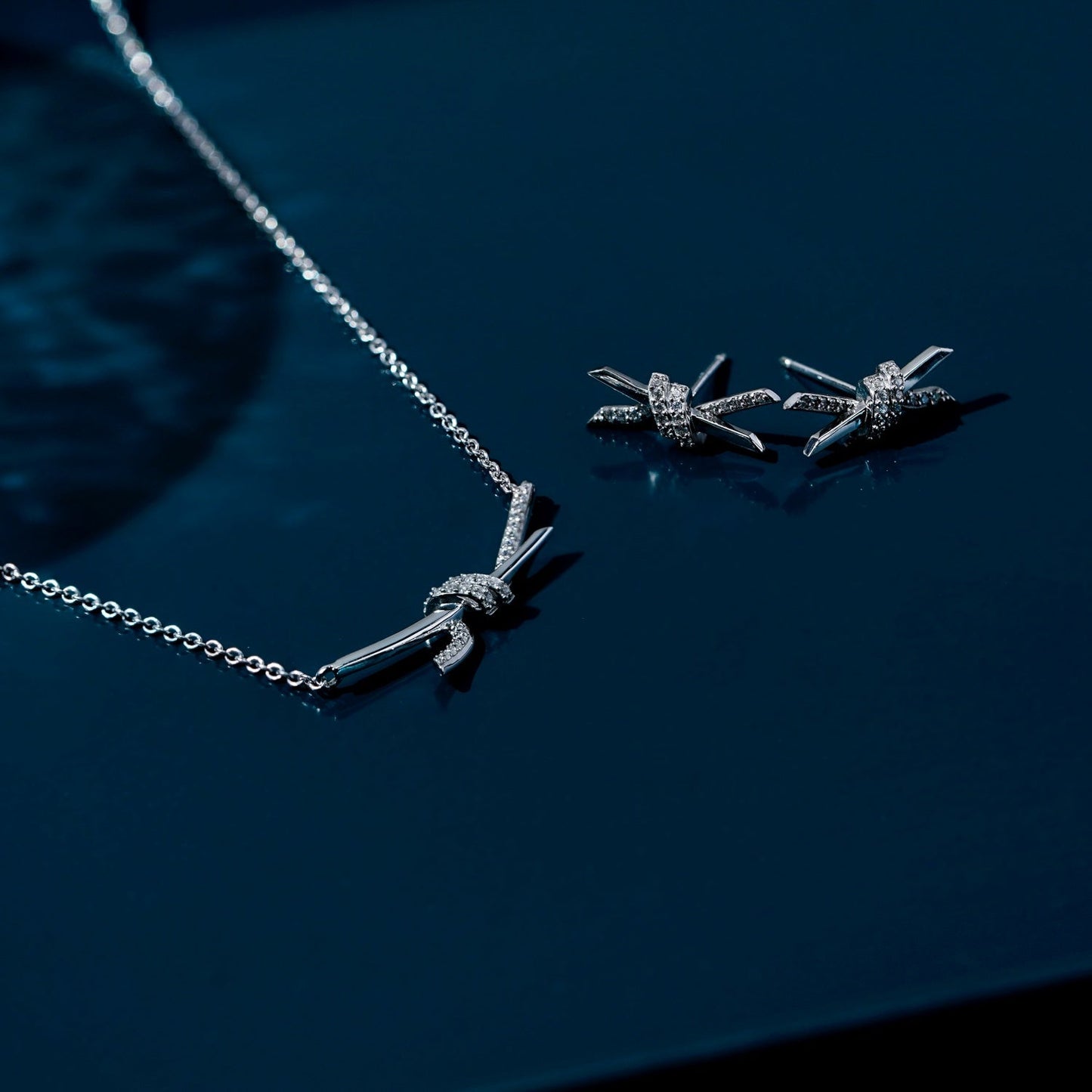 Pave Love Knot Stud Earrings