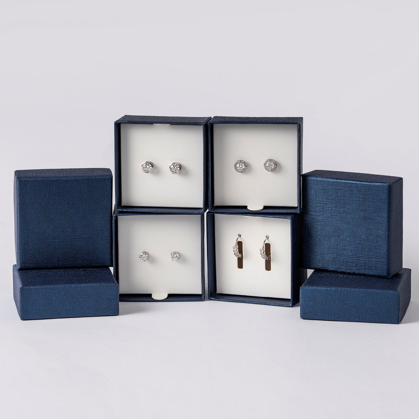 Box 124*41mm with platic sleeves for set  4 earrings